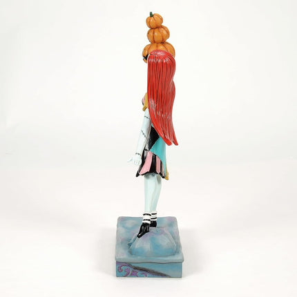 Enesco Disney Traditions by Jim Shore The Nightmare Before Christmas Sally Holding Pumpkins Figurine, 9.06 Inch, Multicolor