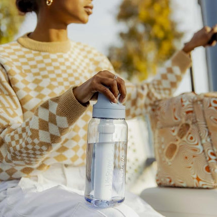 LifeStraw Go Series BPA-Free Water Bottle with Water Filter 1 Litre for Travel and Daily Use Removes Bacteria, Parasites, Microplastics and Improves Taste, Polar White (White)