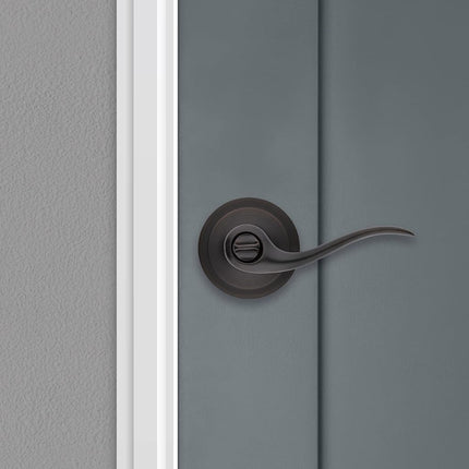 Kwikset Tustin Bed/Bath Lever in Venetian Bronze
