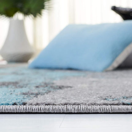 Safavieh Modern Abstract Distressed Indoor Woven Rectangle Area Rug, Adirondack Collection, ADR134, in Turquoise / Grey, 91 X 152 cm for Living Room, Bedroom or Any Indoor Space