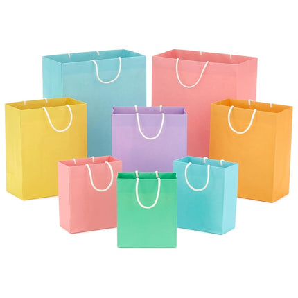 Hallmark Recyclable Gift Bag Assortment (8 Bags: 3 Small 6", 3 Medium 9", 2 Large 13") Pastel Blue, Pink, Yellow, Purple, Orange, Green for Birthdays, Easter, Baby Gifts, Bridal Showers