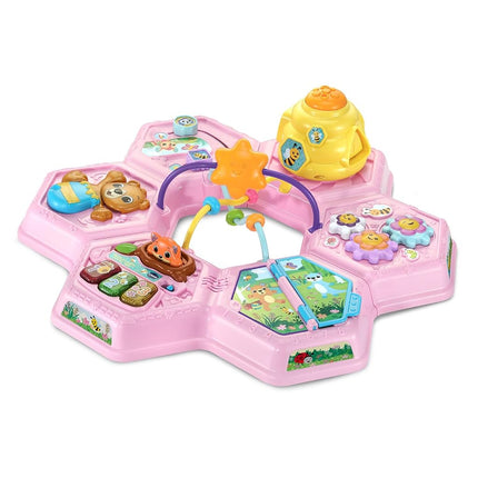 VTech Buzz and Learn activity table with seven interactive play zones, pink