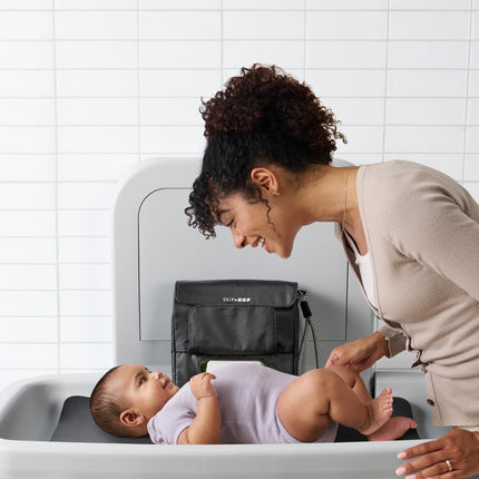 Skip Hop Travel Baby Changing Pad with Easy-Clean Surface, Covers Public Changing Stations, Wipes Pocket, Diaper Storage, Disposable Bag Dispenser and Magnetic Wipes Pocket, Clean Slate, Oat