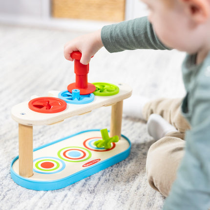Melissa & Doug Trompos giratorios para emparejar y empujar, juguete para desarrollar la habilidad de combinar colores y la motricidad fina para niños de 2 años en adelante - Certificado FSC