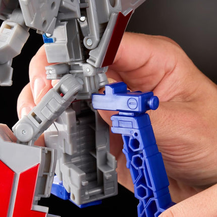 Transformers Icons Optimus Prime 6.75-Inch Voyager Class Action Figure that Converts to Autobot Logo Symbol, Display Stand, Robot Toys for Ages 8+