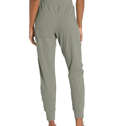 Pantalones de chándal Motion para mujer Under Armour, (504) Grove Green / / Black, 3X