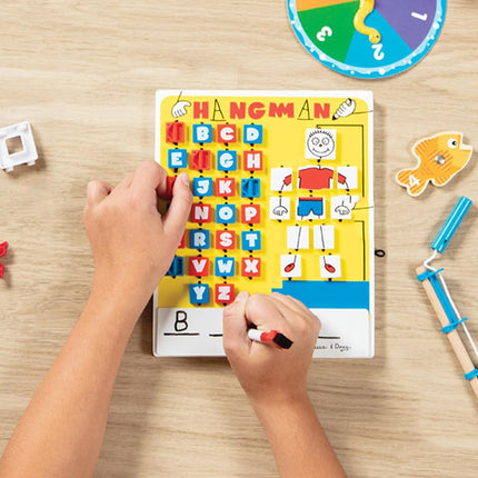 Melissa & Doug Flip-to-Win Hangman Travel Game (Wooden Word Game)