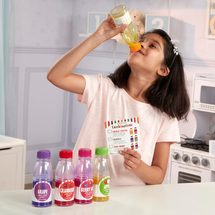 Juego de comida de juguete de Melissa & Doug: botellas de jugo Tip & Sip