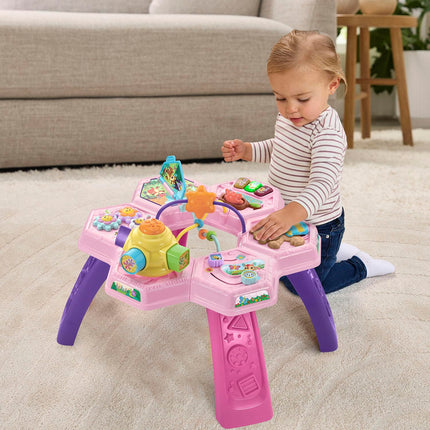 VTech Buzz and Learn activity table with seven interactive play zones, pink