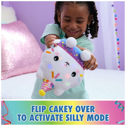 Gabby’s Dollhouse Celebrations, Sprinkle Party Cakey Cat Soft Toy, 25-Centimetre Interactive Soft Toy with Sounds, Kids’ Toys for Girls and Boys Aged 3+