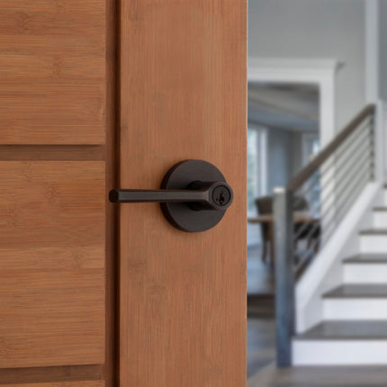 Kwikset Lisbon Round Entry Door Knob with Lock and Key, Secure Keyed Handle Exterior, Front Entrance and Bedroom, Venetian Bronze, Pick Resistant SmartKey Rekey Security and Microban