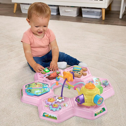 VTech Buzz and Learn activity table with seven interactive play zones, pink