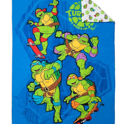 TEENAGE MUTANT NINJA Turtles 4 Piece Toddler Bedding Set – Includes Comforter, Sheet Set – Fitted + Top Sheet + Reversible Pillowcase for Boys Bed, Blue