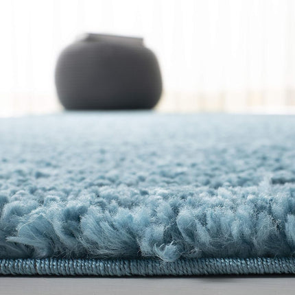 Safavieh Shaggy Indoor Woven Rectangle Area Rug, August Shag Collection, AUG900, in Turquoise, 91 X 152 cm for Living Room, Bedroom or Any Indoor Space