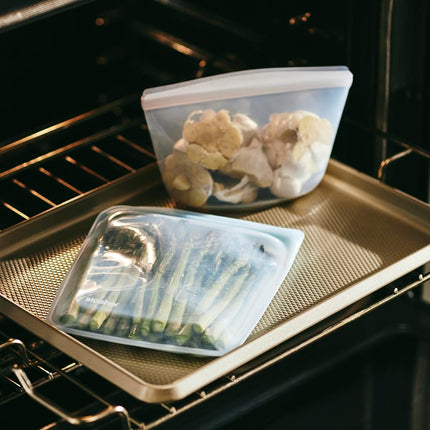 Stasher Silicone Reusable Storage Bag, Quart (Clear), Food Meal Prep Storage Container, Lunch, Travel, Makeup, Gym Bag, Freezer, Oven, Microwave, Dishwasher Safe, Leakproof
