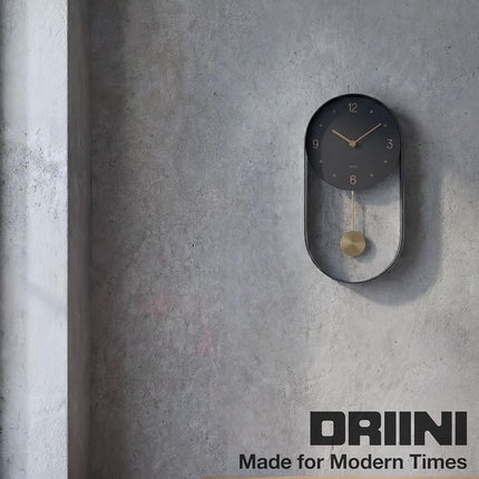 Driini Modern Pendulum Wall Clock - Decorative and Unique Metal Frame, with 8 Inch Face - Contemporary, Minimalist Design, with Silent Battery Operation - Includes Both Black and Gold Pendelum