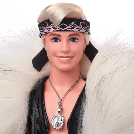 Barbie THE MOVIE, Ken Doll wearing Faux Fur Coat and Black Fringe Vest, fingerless gloves and gold tone chain, HRF31