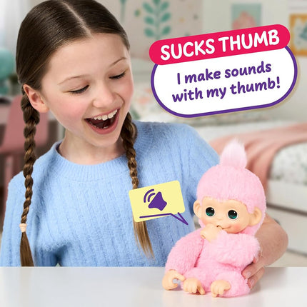 Little Live Pets Baby Monkey Minis – Luna Lemon. Interactive Pet Toy. 20+ Sounds & Reactions. Soft Pink Fur. 7.4" Tall. Feed, Nurture. React. Grippy Hands & Feet. Collect All 3