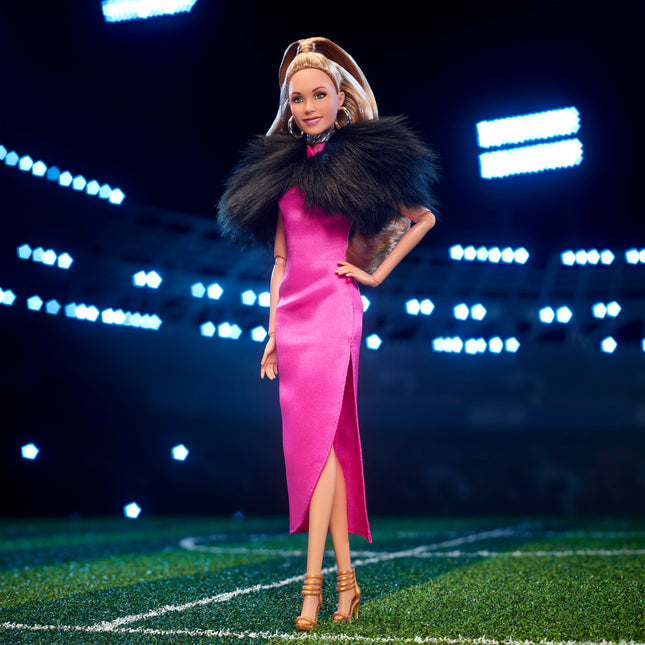 Barbie Signature Doll, Keeley Jones from Ted Lasso Wearing Pink Dress with Faux Fur Cape, Collectible with Displayable Packaging, HJW92