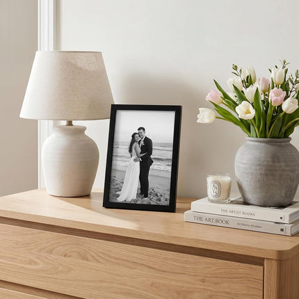 Americanflat 6x9 Picture Frame with Shatter-Resistant Glass - Streamline Collection - Thin Border Photo Frame for Tabletop and Wall Display - Hanging Hardware and Easel Stand Included - Black