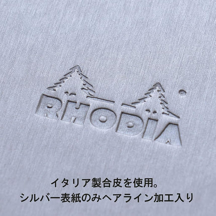 RHODIA 118069C - Rigid Black Webnotebook - A6 - Lined - 192 pages - Clairefontaine Ivory Paper 90 g/m - Bookmark, Elastic Closure - Faux Leather Cover