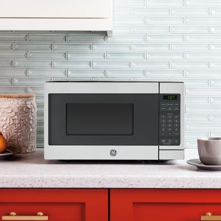 GE GCST07N1WSS Microwave Oven, 700 Watts, 6 Auto-Cook Settings, Kitchen Essentials for Countertop, Bedroom, or Apartment, Child Lock Technology 0.7 Cu. Feet, Steel
