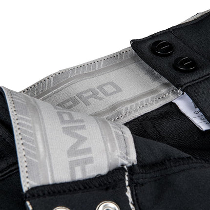 CHAMPRO Pantalones de béisbol cónicos Triple Crown 2.0 para niño, color negro