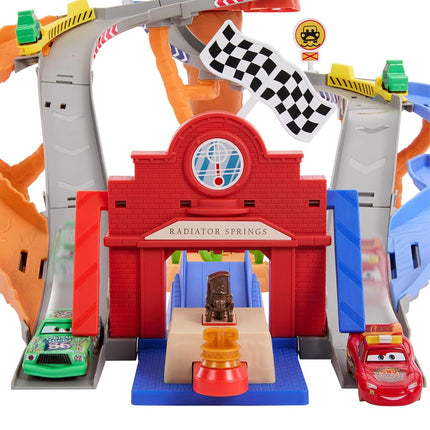 Mattel Disney and Pixar Cars Toy Playset, Lightning McQueen & Chicks Hicks & 2 Pitty Crew Vehicles, 2 Ways to Race, Race & Rescue Rescue Road Raceway, JFL57