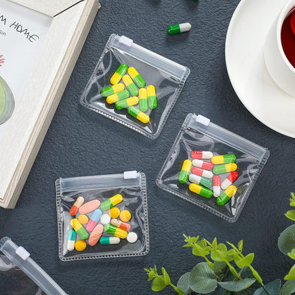 Nuanchu Pill Pouch Bags Zippered Pill Pouch Set Reusable Pill Baggies Clear Plastic Pill Bags Self Sealing Travel Medicine Organizer Storage Pouches with Slide Lock for Pills and Small Items (200)