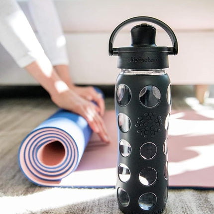 Lifefactory 22-Ounce Glass Water Bottle with Active Flip Cap and Protective Silicone Sleeve, Plum