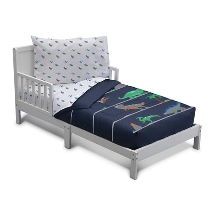 Juego de ropa de cama para cuna de 4 piezas Delta Children para niños - Edredón reversible 2 en 1 - Incluye edredón ajustable para mantener a los pequeños cómodos, sábana bajera, sábana encimera, funda de almohada - Dinosaurio Jurásico