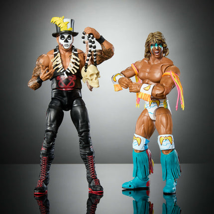 Mattel WWE Ultimate Edition Paquete de 2 figuras de acción, set coleccionable Greatest Grudges '92 con superestrellas de 6 pulgadas Ultimate Warrior y Papa Shango y accesorios