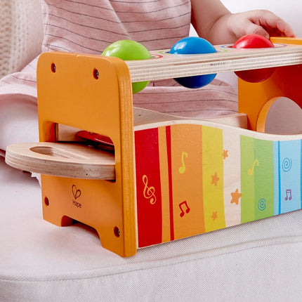 Hape Multifunctional Pound & Tap Bench with Slide-Out Xylophone | Durable Wooden Musical Pounding Toy for Toddlers 12 Months and Up