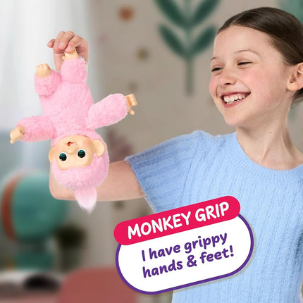 Little Live Pets Baby Monkey Minis – Luna Lemon. Interactive Pet Toy. 20+ Sounds & Reactions. Soft Pink Fur. 7.4" Tall. Feed, Nurture. React. Grippy Hands & Feet. Collect All 3