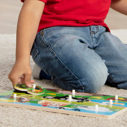 Melissa & Doug Rompecabezas de granja con clavijas