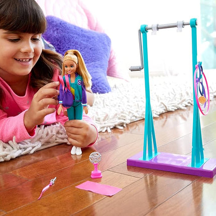 Barbie GBK59 Team Stacie Doll and Gymnastics Playset with Spinning Bar and 7 Themed Accessories, Multicoloured