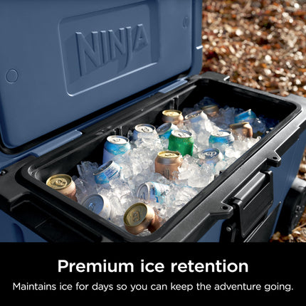 Ninja | Nevera | Nevera FrostVault 65QT con ruedas | Aislada con cajón de almacenamiento seco a temperatura | Mantiene el hielo frío durante días | Para la playa, camping, picnics y más | Azul Lakeshore | FB265BL