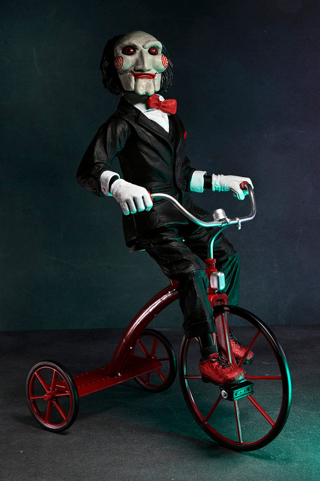 Marioneta de Saw de NECA de 12 pulgadas con triciclo y sonido
