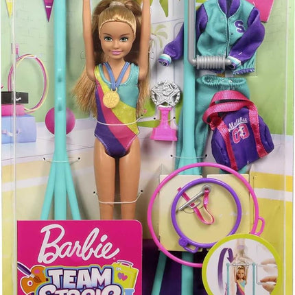 Barbie GBK59 Team Stacie Doll and Gymnastics Playset with Spinning Bar and 7 Themed Accessories, Multicoloured