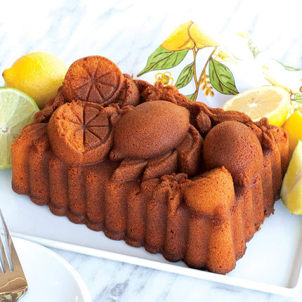 Moule à cake Nordic Ware Citrus Blossom Loaf Pan, moule Bundt original en fonte d'aluminium, moule à cake avec motif citron, moule à gâteau fabriqué aux États-Unis, couleur : caramel, capacité 6 tasses
