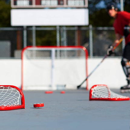 Franklin Sports Palets de hockey sur roulettes NHL Street - (6) Palets de hockey sur roulettes Pro Commander pour l'entraînement - Palets de hockey sur roulettes avec roulettes - Palet de hockey extérieur parfait - Rouge
