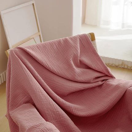 Couverture en mousseline de coton Simple&Opulence, 4 couches pour lit, canapé, couverture tissée en gaze avec pompons, douce, légère, douillette, prélavée, respirante, décoration de ferme pour toutes les saisons (rose poudré)