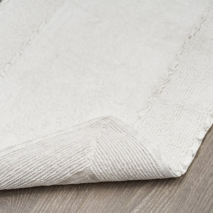 Juego de 2 alfombras de baño de algodón con volantes Laura Ashley, blancas