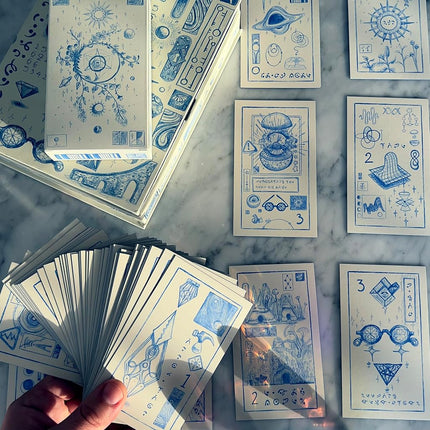 Prisma Visions The Cerulean Sequence Numerology Oracle Deck with hardcover Guidebook, Unique Hand-Drawn Style and Keepsake Box. Decode The Cipher and Uncover The Story Behind The Cards.