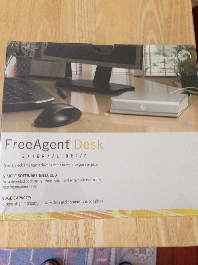 Seagate FreeAgent Desk 1 TB USB 2.0 Desktop External Hard Drive ST310005FDA2E1-RK (Silver)