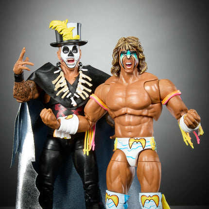 Mattel WWE Ultimate Edition Paquete de 2 figuras de acción, set coleccionable Greatest Grudges '92 con superestrellas de 6 pulgadas Ultimate Warrior y Papa Shango y accesorios