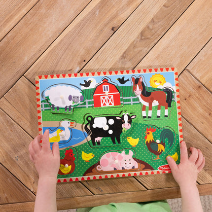 Melissa & Doug Rompecabezas de granja con clavijas