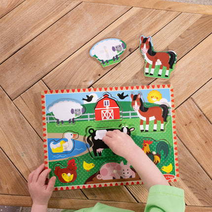 Melissa & Doug Rompecabezas de granja con clavijas