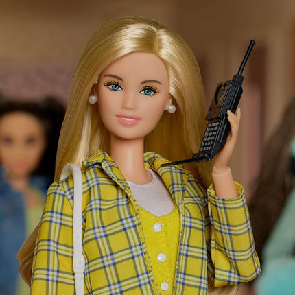 Barbie Signature Doll, Clueless Cher Collectible in Yellow Plaid Suit with Backpack, Cell Phone, & Learner’s Permit Accessories, JBJ34