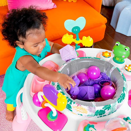 Bright Starts, Bounce Bounce Baby 2-in-1 Activity Center Jumper and Table - Playful Palms with 7 Interactive Toys, Adjustable Height, Storage Bag, 360° Rotation, Ages 6 Months +, Pink